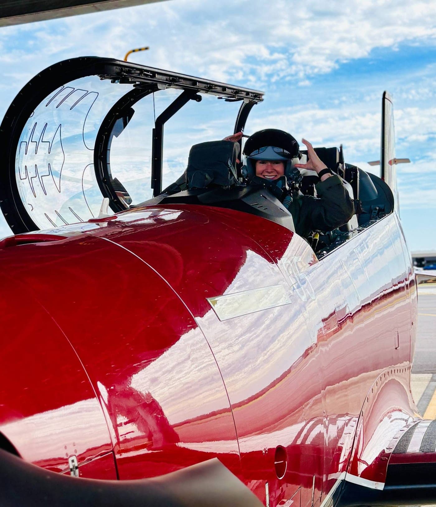 A pilot in a cockpit before a flight